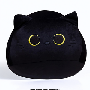 A plushie toy resembling a black cat with a cheeky expression, hidden in a playful pose.